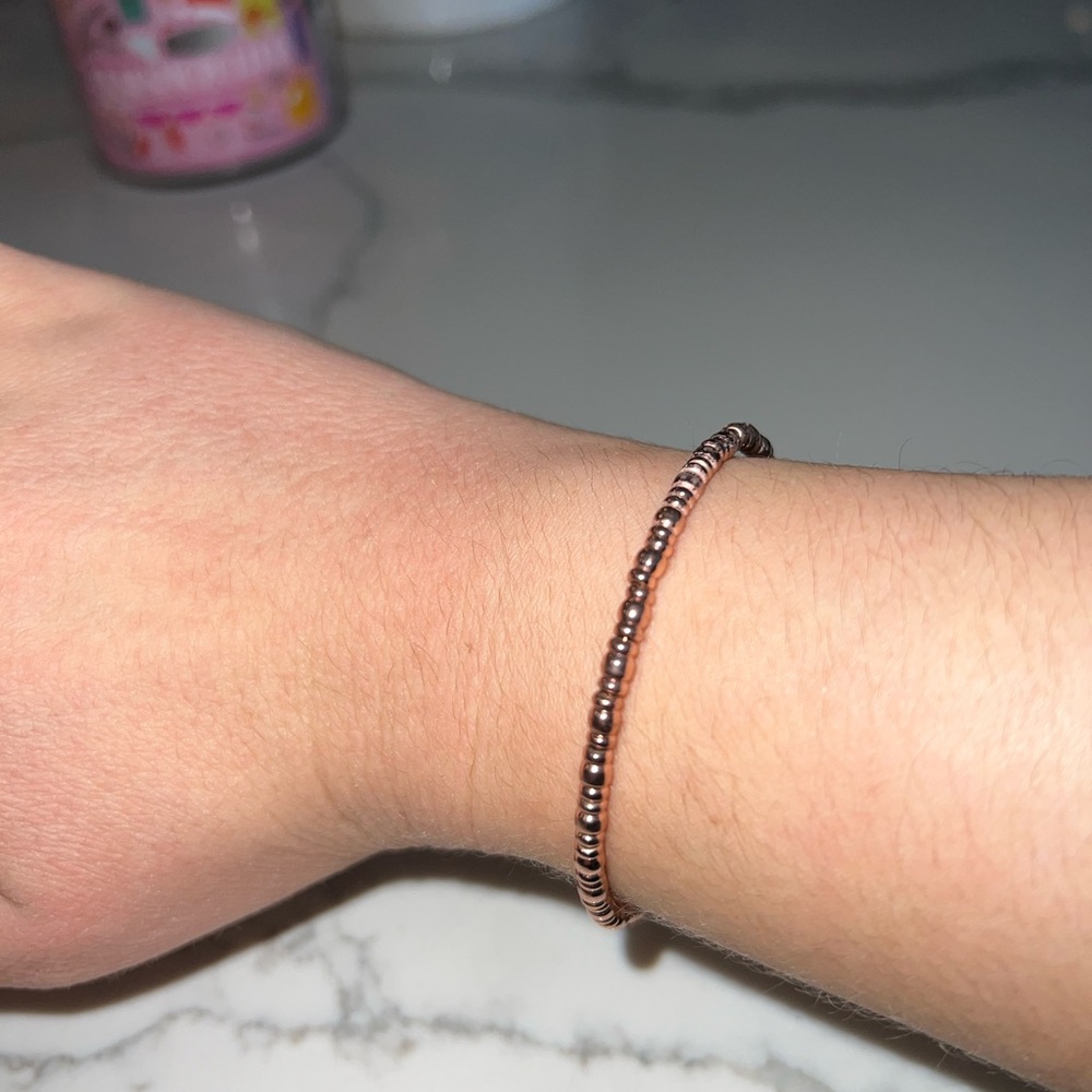 Rose gold Alex and Ani bangle